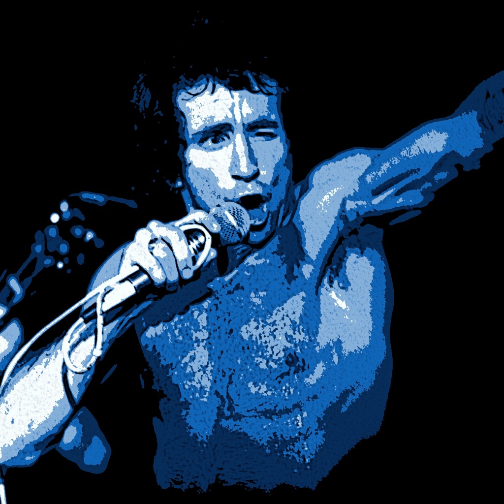 BON SCOTT OF AC-DC PERFORMING LIVE IN SPOKANE, WA. ON 7-26-78. PHOTO BY BEN UPHAM. MAGICAL MOMENT PHOTOS.
