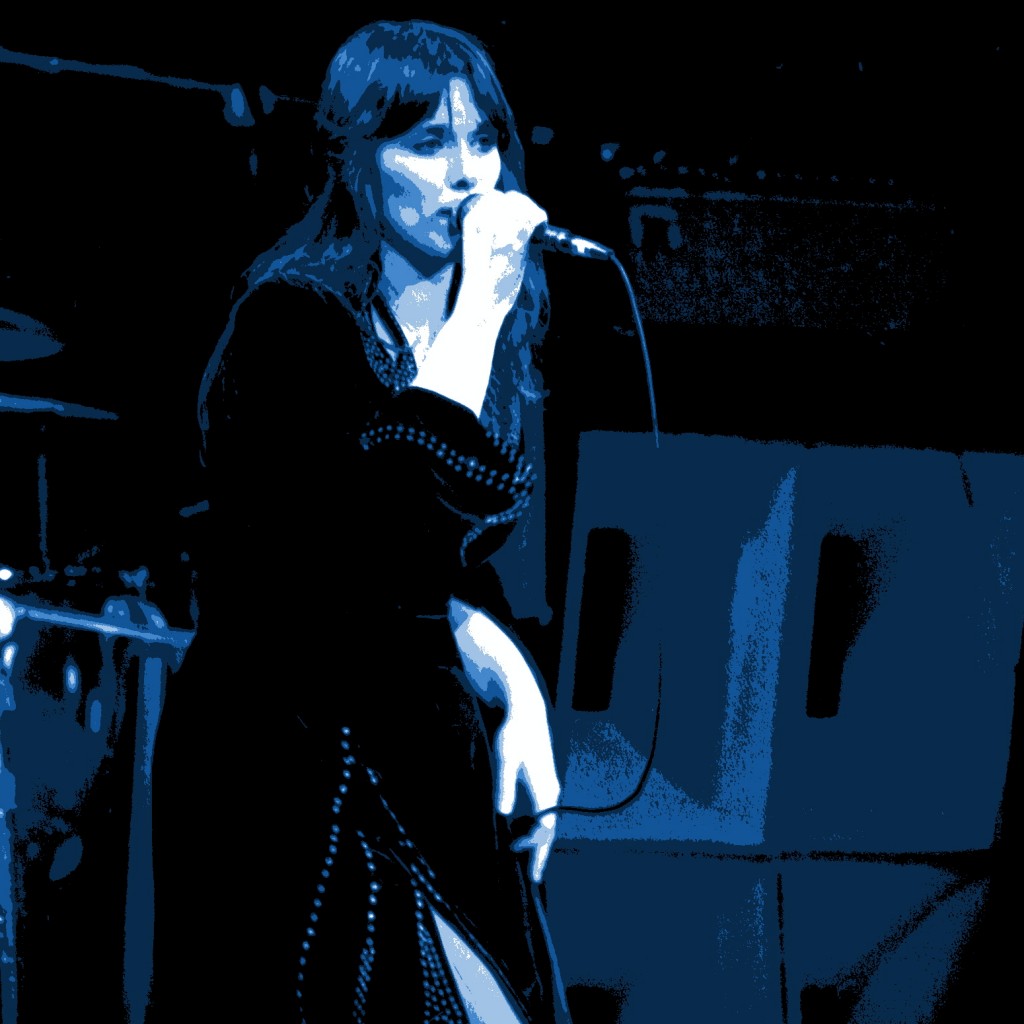 Heart performing in Oakland, California on 12-31-77. Photo by Ben Upham. Magical Moment Photos. Ann Wilson on Vocals.