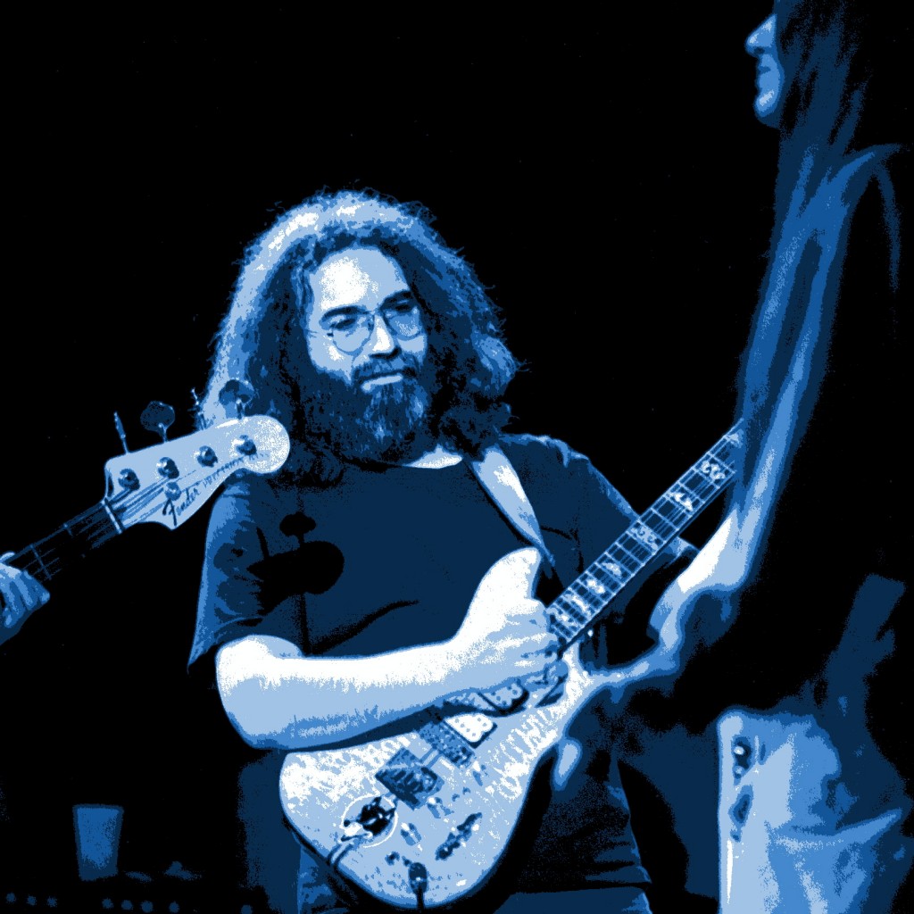 JERRY GARCIA PLAYING IN CHENEY, WASHINGTON ON 10-27-78. PHOTO BY BEN UPHAM. MAGICAL MOMENT PHOTOS.
