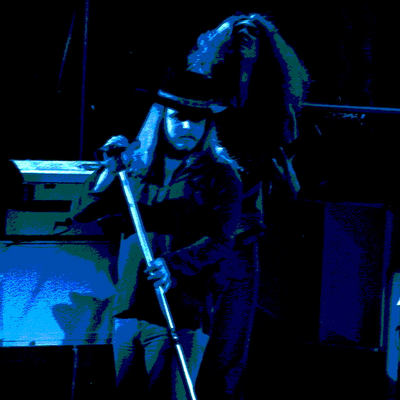 RONNIE VAN ZANT AND ALLEN COLLINS OF LYNYRD SKYNYRD AT WINTERLAND ON 3-6-76. PHOTO BY BEN UPHAM. MAGICAL MOMENT PHOTOS.
