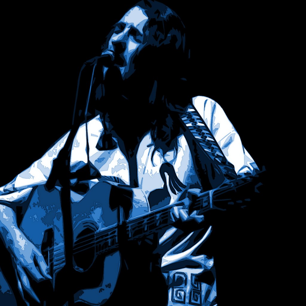 ROGER HODGSON OF SUPERTRAMP PERFORMING LIVE IN SPOKANE ON 4-15-77. PHOTO BY BEN UPHAM. MAGICAL MOMENT PHOTOS.